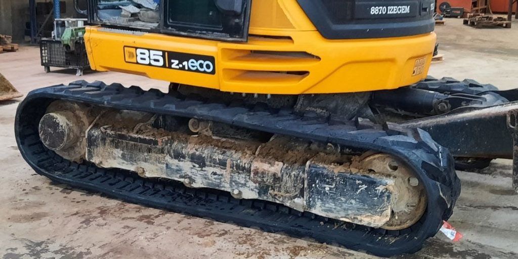 Cadena de goma montada en máquina JCB 85Z